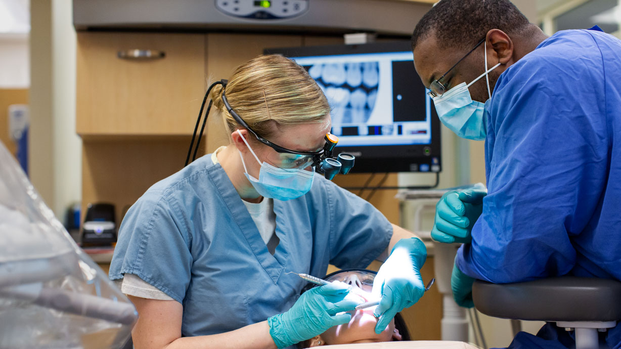 Dentist at work with a patient